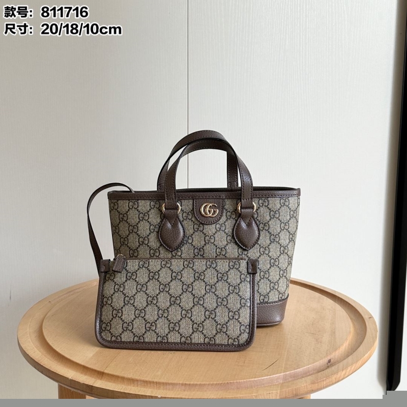G*u*i shopping bags